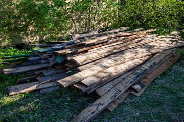 Fototapeta premium a pile of old wooden planks