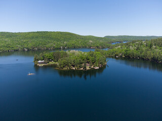 Drone aerial shot over Grand Lake in Val-des-Monts, QC, Canada