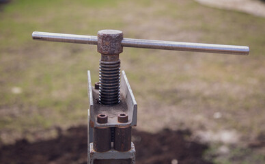 Metal vise for bending pipes.