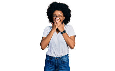 Fototapeta na wymiar Young african american woman wearing casual white t shirt laughing and embarrassed giggle covering mouth with hands, gossip and scandal concept