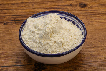 Wheat flour heap in the bowl