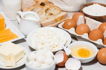 assortment of fresh dairy products on white background, closeup