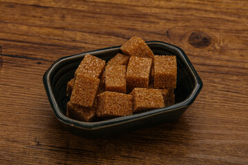 Cane sugar cubs in the bowl