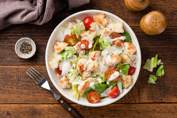 Delicious Caesar Salad With Grilled Chicken Breakfast Served On Plate, Old Wooden Table Background