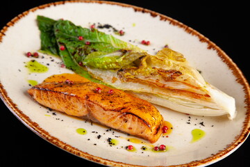 Salmon steak with grilled cabbage
