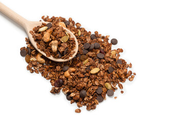 Chocolate granola cereal with nuts in a wooden spoon.