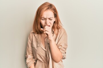 Young caucasian woman wearing casual clothes feeling unwell and coughing as symptom for cold or bronchitis. health care concept.