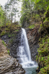 Mountain waterfall.  Waterfall in the Carpathian mountains.