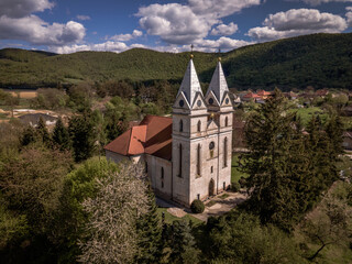 Aerial view of the church in the village of Krasnohorska Dlha Luka in Slovakia