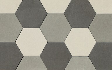 Hexagonal tiles for outdoors and pavements, top view. Colors are black, white and gray.	
