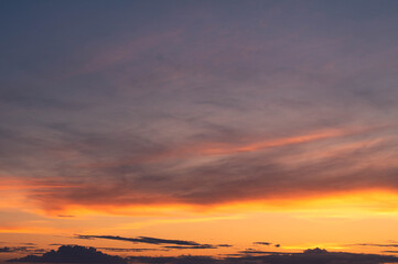 Beautiful sunset with scattered small clouds in the sky. Resource for replacement of skies.