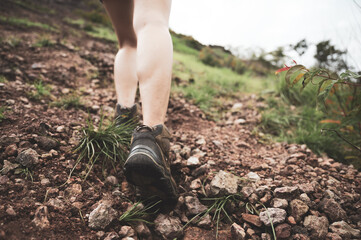 Hikers woman person with backpacks walking and travel to the mountain nature outdoor, adventure hiking sport lifestyle for trekking tourist activity, summer vacation journey to freedom relaxation