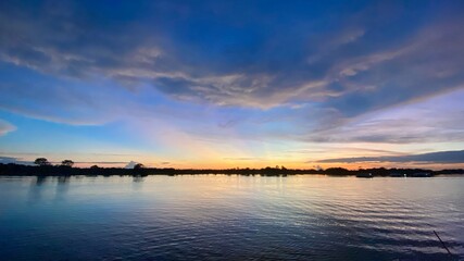 Naklejka na ściany i meble Sunset at Janauaca lake in Manaquiri. Amazonas - Brazil.