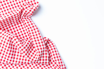 Top view napkin checkers red and white on a white background. Fabric crumpled red and white Isolated with copy space.