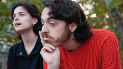chatty young woman - guy with his face bored by his friend's chatter