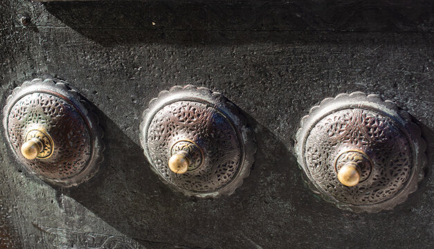 Closeup shot of knobs of an old building