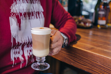 coffee late  in hand of man