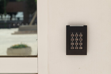 Access control system to enter a building. Buttons to dial the secret code and access the room or...