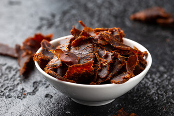 Dried Beef Jerky snack in white bowl