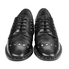 Women's leather boots close-up black color. Oxford style shoes. Casual shoes.
