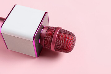 Modern microphone on color background, closeup