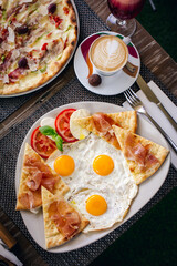 eggs and pizza and coffee in restaurant breakfast