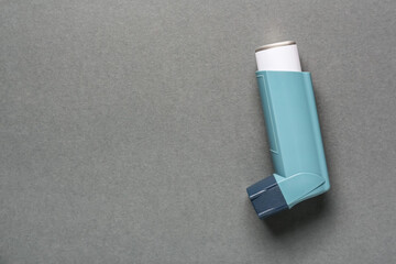 Modern inhaler on grey background