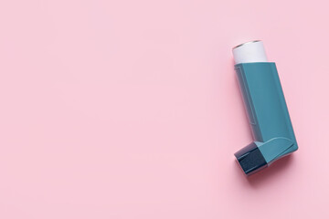 Modern inhaler on color background