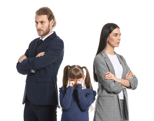 Crying little girl and her upset parents on white background