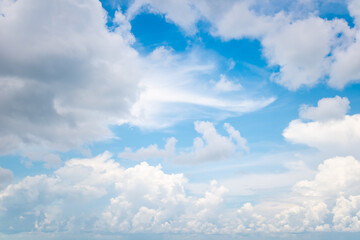 Beautiful white fluffy cloud on blue sky background.
