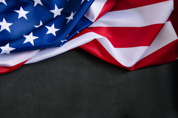 American flag on dark concrete background. USA national holidays concept. Independence Day, Memorial Day, Labor Day.