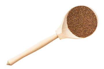 top view of whole-grain teff seeds in wood spoon