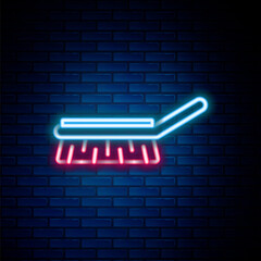Glowing neon line Brush for cleaning icon isolated on brick wall background. Cleaning service concept. Colorful outline concept. Vector