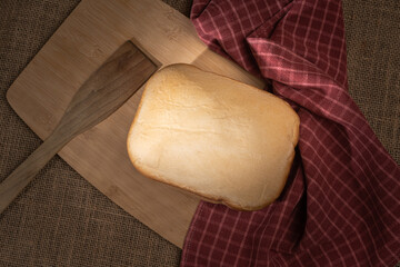 White bread healthy homemade on wooden board under sunray