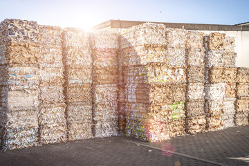 Bales of cardboard and box board with strapping wire ties