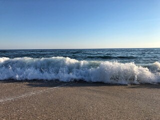 waves on the mediterranean sea, Turkey. Beautiful sunset on the beach