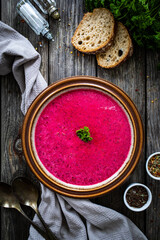 Beetroots soup on wooden table
