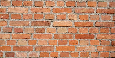 natural red bricks of different sizes and shades for background