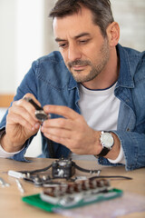 clockmaker repairing wrist watch macro shot