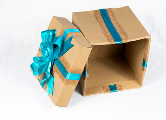 Recycled cardboard gift box on holidays, original gift packaging.