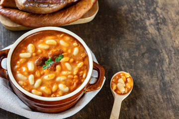 Homemade baked beans with sausage and bacon