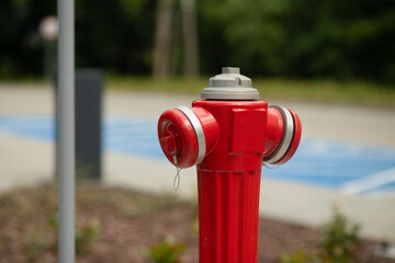Fototapeta na wymiar Red water hydrant close up