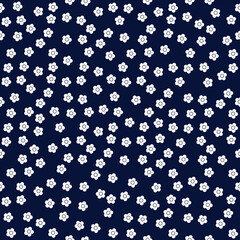 Fototapeta na wymiar Floral seamless vector pattern. White flowers on a dark blue background.