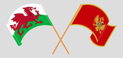 Crossed and waving flags of Wales and Montenegro