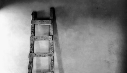 Black and White Handmade Ladder on a Construction Building