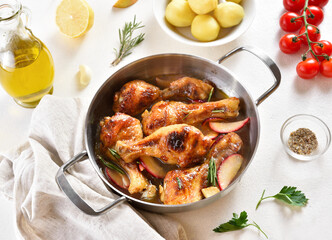 Chicken drumsticks baked with apples