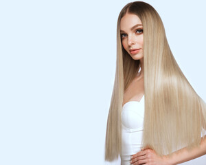Beautiful blond girl with a perfectly smooth hair, and classic make-up. Beauty face and hair.