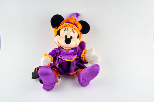 Minnie mouse plush toy in a Halloween costume