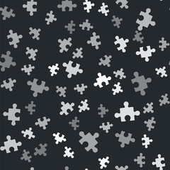 Grey Piece of puzzle icon isolated seamless pattern on black background. Business, marketing, finance, layout, infographics, internet concept. Vector