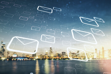 Abstract virtual postal envelopes hologram on Chicago cityscape background, email and notification concept. Multiexposure